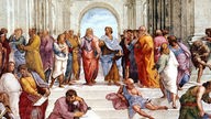 Gemälde von Raffael: "Schule von Athen" ca. 1510. Versammlung der wichtigsten griechischen Philosophen. Platon und Aristoteles stehen zentral in der Mitte.